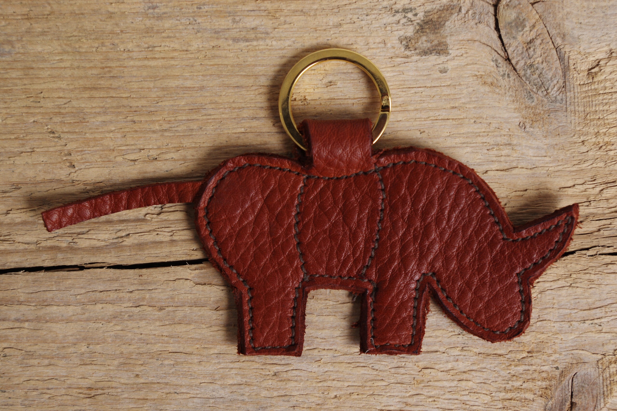 Reclaimed leather keychain with rhino embellishment